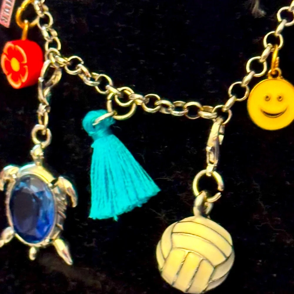 Wander Silver Tone Charm Bracelet